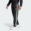 Men's adidas Essentials Warm-Up Tapered 3-Stripes Track Pants