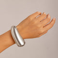 Metallic Teardrop Spring Bangle